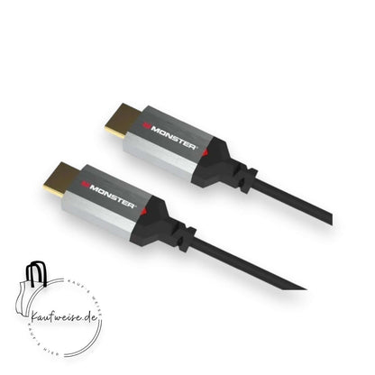 Abgebildet sind zwei Monster Essentials HDMI-Kabel 1,8m von Monster Cable Products, Inc. mit silbernen und schwarzen Steckern. Die Kabelstecker tragen das Monster-Logo und unterstützen hohe Übertragungsraten für 4K Ultra HD-Inhalte. Sie sind auf einem weißen Hintergrund mit einem „kaufweise.de“-Wasserzeichen in der unteren linken Ecke platziert.