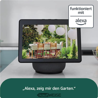 Schwarzer Smart-Display zeigt Gartenszene mit Blink Outdoor 4 Überwachungskamera Set