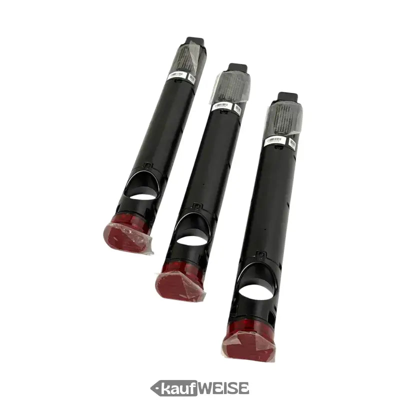 Drei schwarze Vanmoof X3 Smart Cartridge T4 Tonerkartuschen im Bild